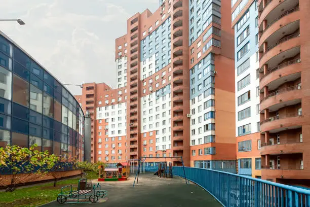 Playground for children on the roof and house building exterior mixed-use urban multi-family residential district area development