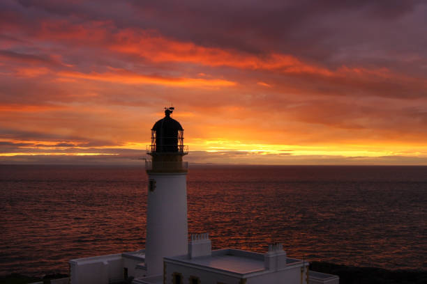 istock Sunset at a lighthouse near Melvaig 1185730053
