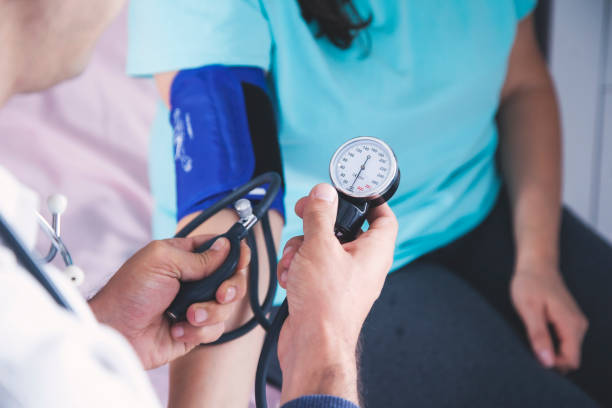 istock doctor hand Pressure Equipment with ill 1185734139