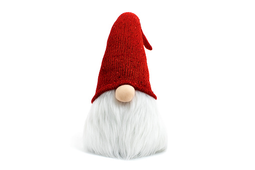 Gnome a Christmas elf wearing big red with glitters hat and standing on white background