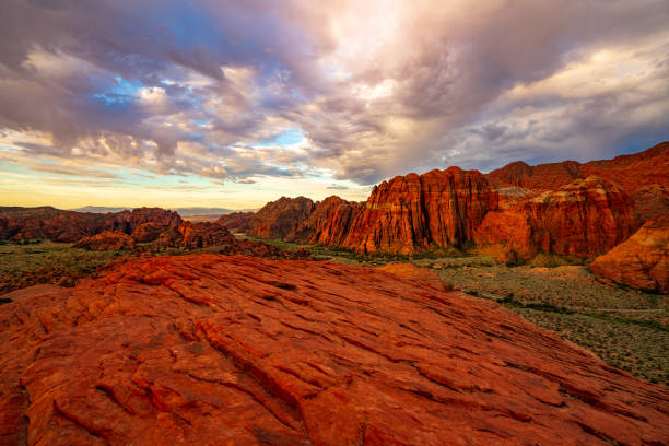 Red Mountain at Sunrise from the Petrified Sand Dunes in Snow Canyon State Park Snow Canyon State Park, Utah, USA snow canyon state park stock pictures, royalty-free photos & images