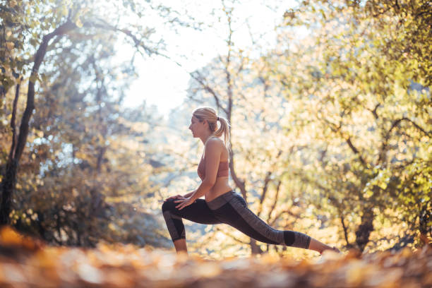 istock Woman running. Female runner jogging, training for marathon. 1185742491