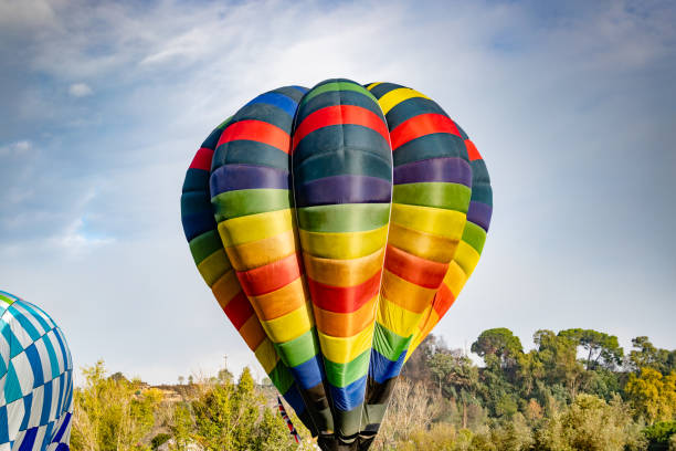 istock Multiple colorful Hot Air Balloons in clear blue sky. 1185742601