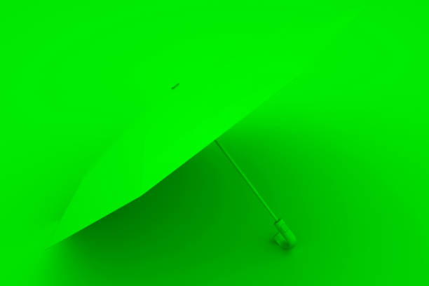 istock Green Umbrella on yellow background. Summer concept. 3d illustration 1185742646