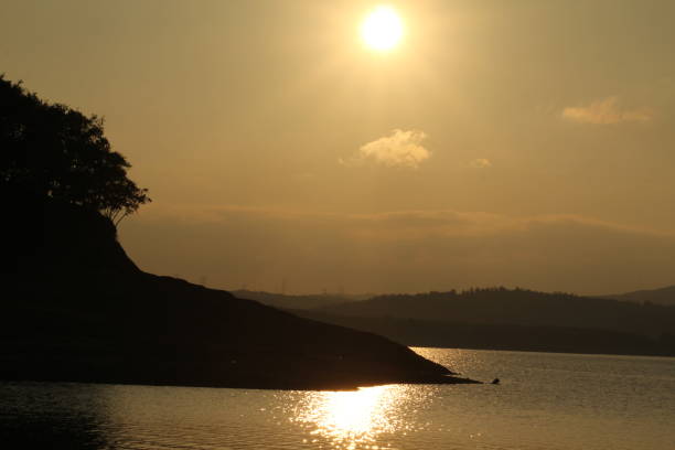 istock sunset sea sun sea waves glow moonlight sun glare 1185742709
