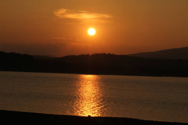 istock sunset sea sun sea waves glow moonlight sun glare 1185743899