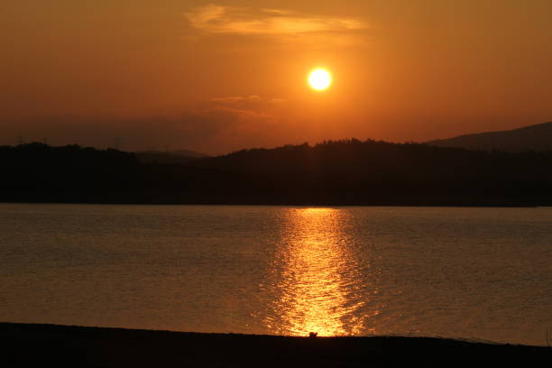 istock sunset sea sun sea waves glow moonlight sun glare 1185744104