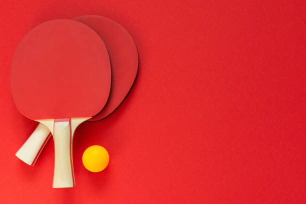 istock Red tennis ping pong rackets 1185745119