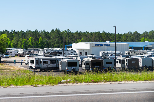 Biloxi, USA - April 24, 2018: Industrial factory in Mississippi with warehouse business called Camping World for RV trailers Coleman trucks