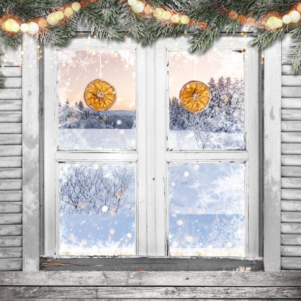 istock Christmas old white window with decorations. 1185745398