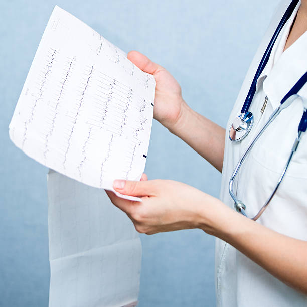 istock Doctor with EKG 118574629