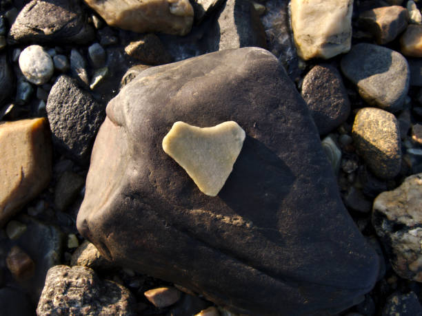 heart stone on mountains background stock photo