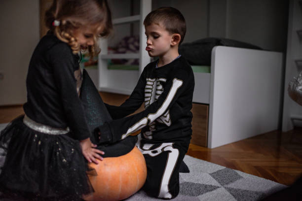 istock Costumed kids are ready for the Halloween night 1185750681