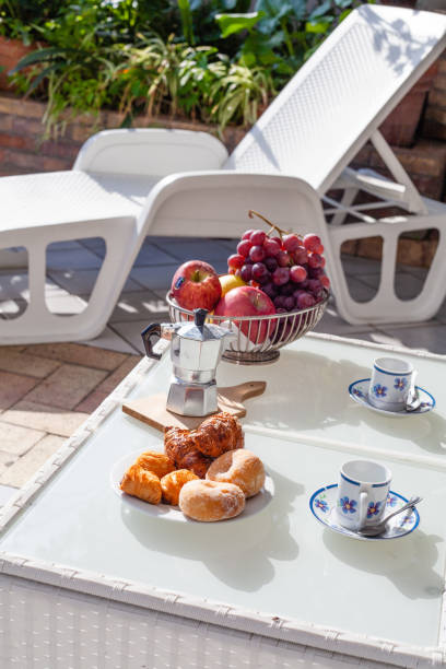 istock Sunny Italian Breakfast and Chairs for Relax 1185751239