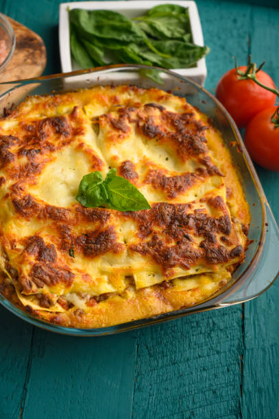 istock Delicious Lasagna, Italian cuisine. Pasta. Vertical frame with ingredients. 1185755155
