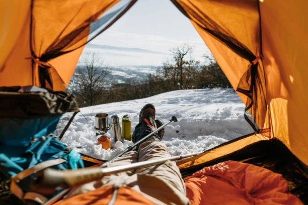 istock Morning view from tent on winter hiking 1185757782