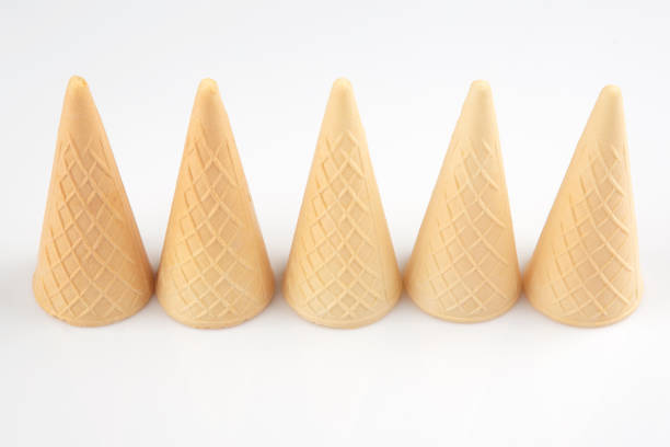 istock Empty waffle cups on a white background. Preparation for desserts and ice cream 1185769391