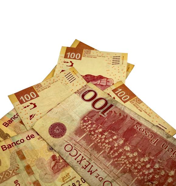 istock A group of mexican peso bills isolated on white background 1185770439