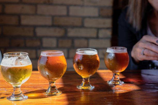 beer flight at brewery - rustic beer brewery indoors imagens e fotografias de stock