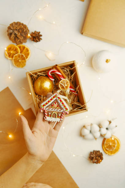 istock Process of packing gifts for holidays. 1185773763