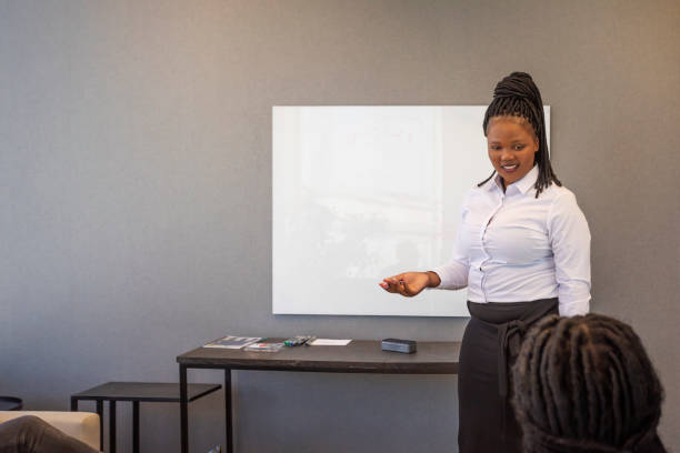 istock African Woman Making a Business Presentation 1185779413