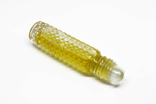 istock Beautiful attar perfume isolated in white background 1185779644