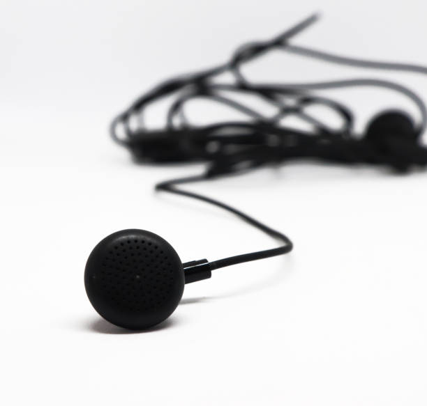 istock Black Color Earphones Isolated on White background 1185780306