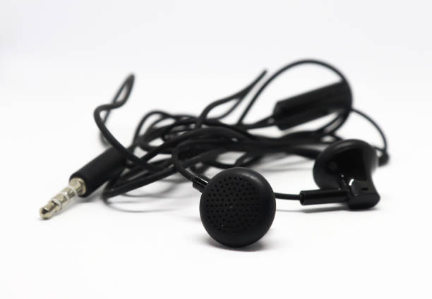 istock Earphone. Black Earphones Isolated on White background 1185780309