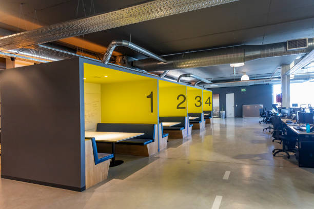 istock Booth Office in a Trendy Workplace 1185780381