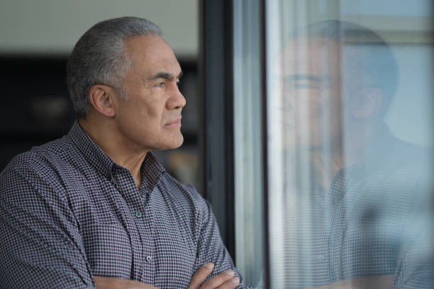 istock Senior Man Deep in Reflection stock photo 1185783162