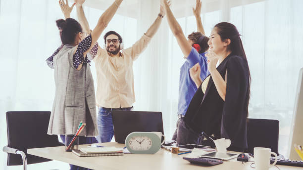 istock Successful business people celebrating success. 1185788760