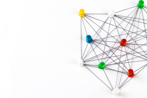 istock Network connection made from push pins and thread on blue background, close-up. 1185789473