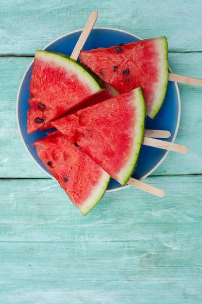 istock watermelon pops for a picnic on turquoise background 1185793502