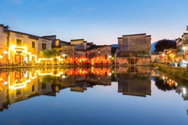 istock ancient villages and reflection in nightfal 1185801424