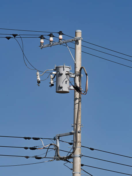 istock Electric wires and utility poles 1185802397