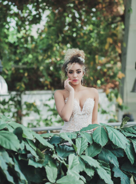 istock beautiful bride in a dress 1185804378