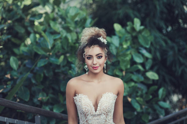 istock cute bride in wedding dress 1185804389