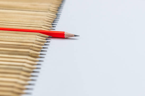 istock Different pencil standout show leadership concept. 1185804469