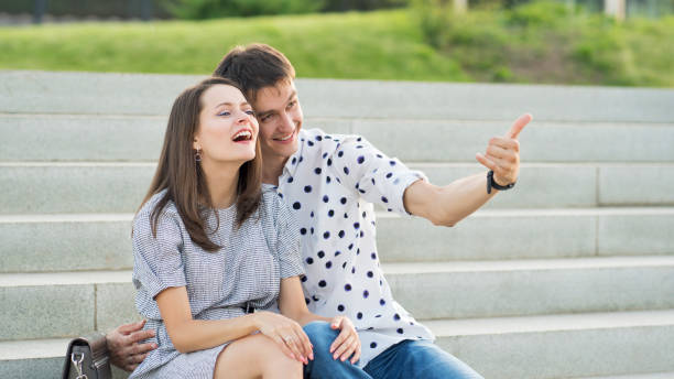 istock Lovers walk in the summer park 1185806792