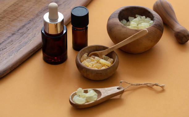istock Chios mastic tears and essential oil on orange color background 1185808981