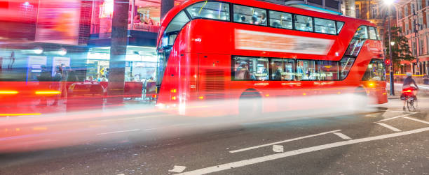 istock Buses in London with light trails at night 1185811045