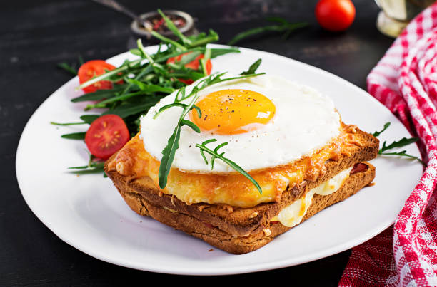 Breakfast. French cuisine. Croque madame sandwich close up on the table. stock photo