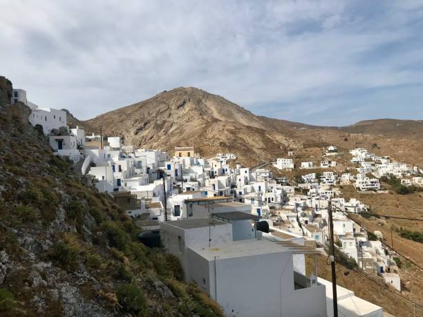 istock traditional greek island white town on a mountain 1185812643