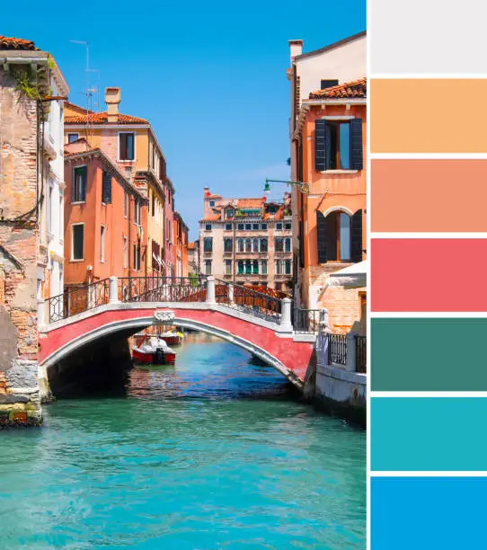 Color matching palette from travel background with old aged orange houses, pink bridge and turquoise water in canals in central Venice in Italy under blue sky