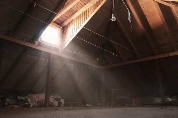 brighten attic with light rays at window