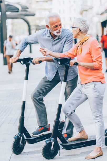 istock Modern senior couple with electric scooter 1185827988