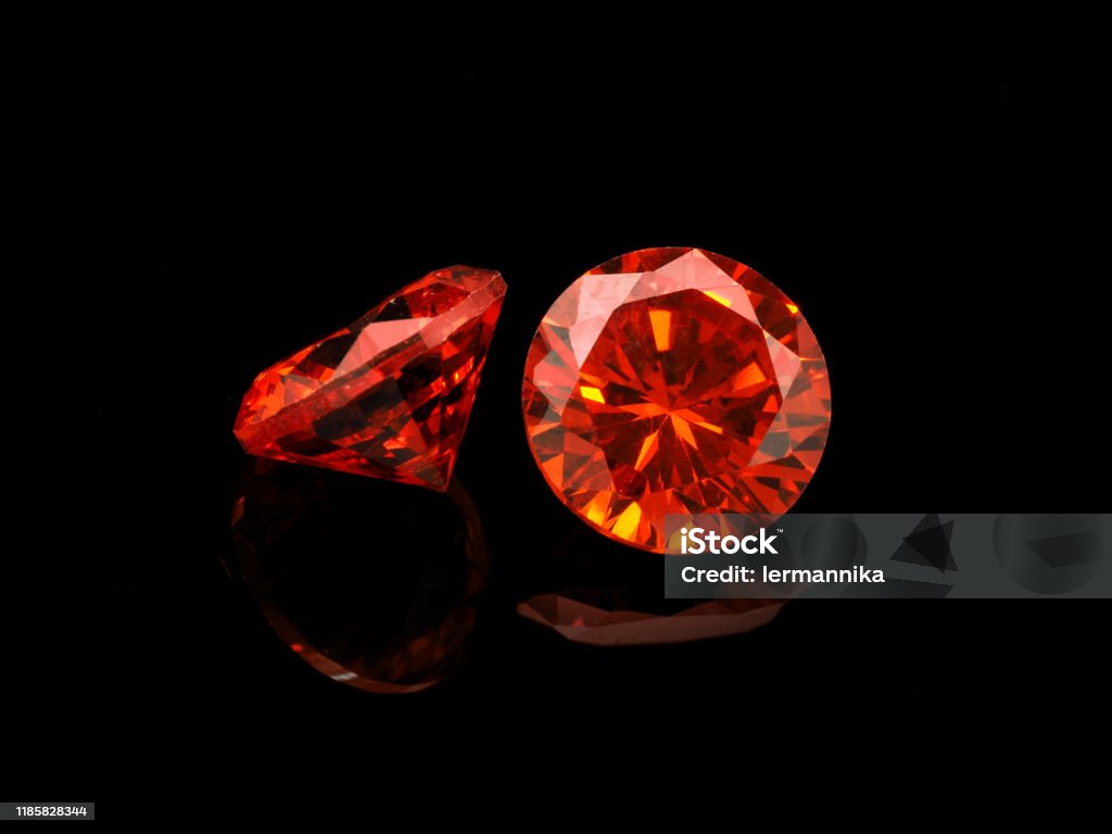 Light Red Semi-Precious Gemstone Light Red Semi-Precious Gemstone on a Black Background. Ruby Stock Photo