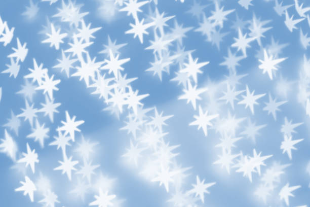 istock Christmas background - star shape bokeh in blue tones 1185832672