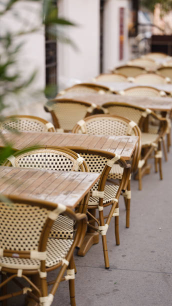 istock Restaurant terrace with empty tables and chairs. 1185837203