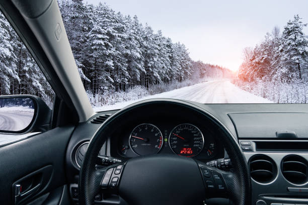 istock The car on a winter road 1185838403